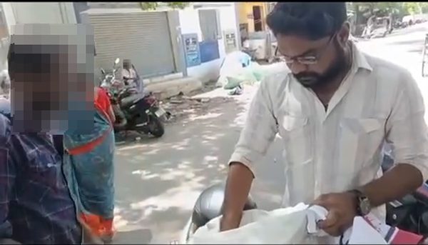 Volunteers distributing supplies outdoors